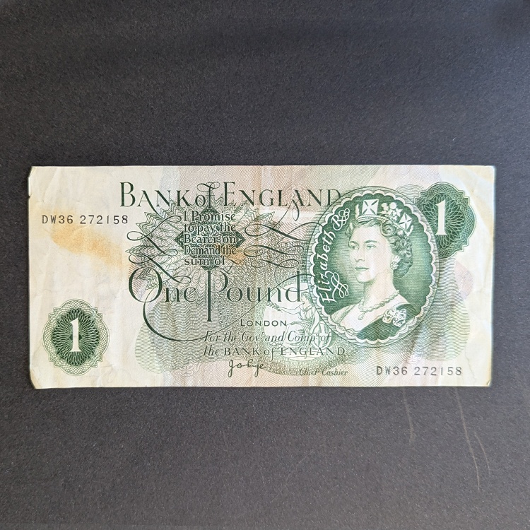 billetes-24 Billete de 1 libra del Reino Unido (1978-1981) - Isabel II e Isaac Newton